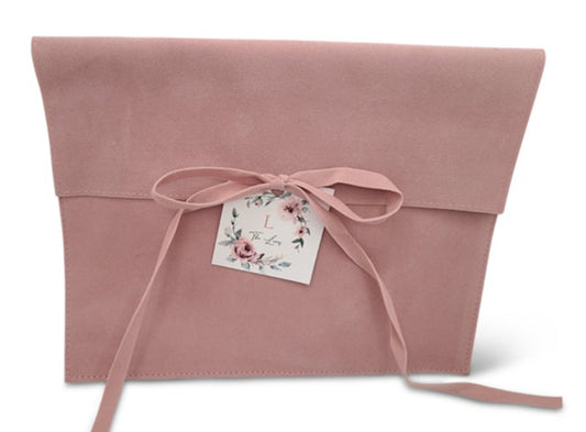 Pink Suede MIshloach Manos Pouch with Floral Tag.