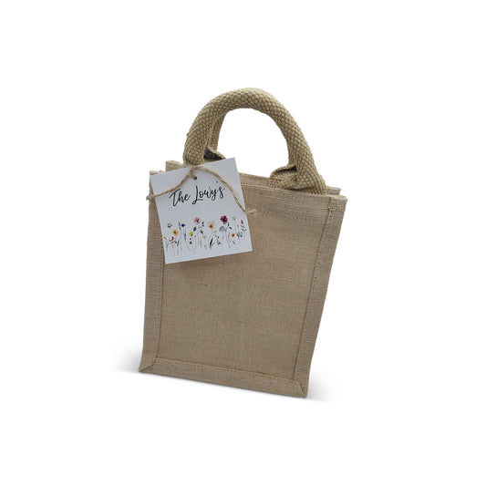 Burlap Tote Bag with Wildflower Design Tag. Measures 6 x 7 x 4 inches.