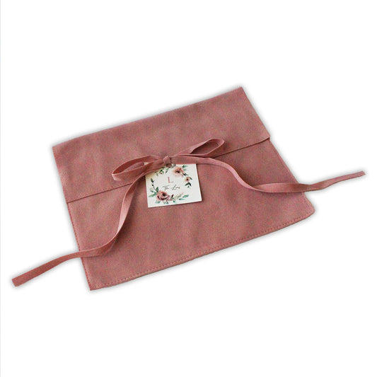 Pink Suede MIshloach Manos Pouch with Floral Tag.