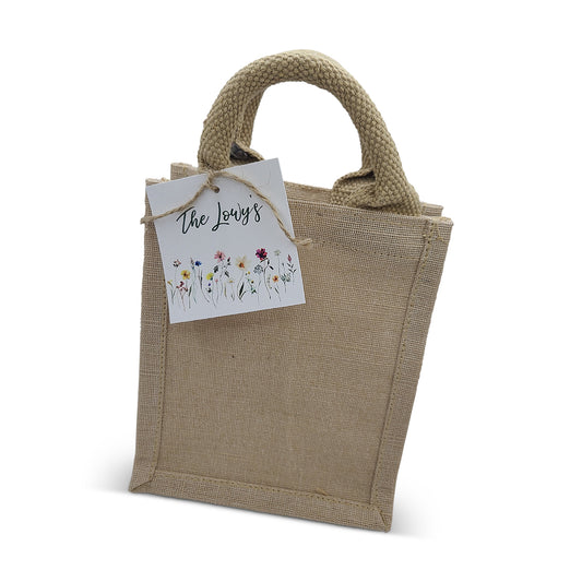 Burlap Tote Bag with Wildflower Design Tag. Measures 6 x 7 x 4 inches.